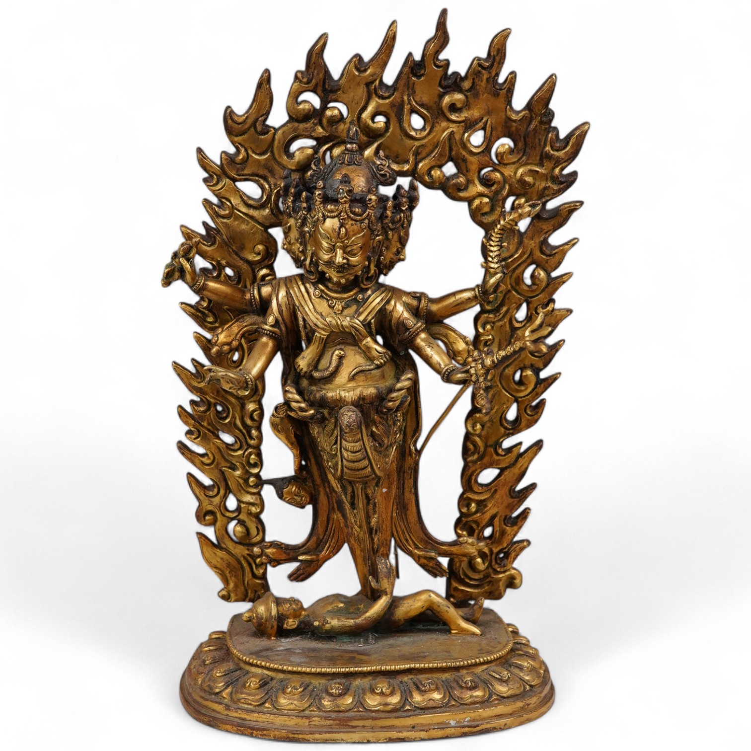 A gilt bronze figure of multi arm Mahakala, 34cm